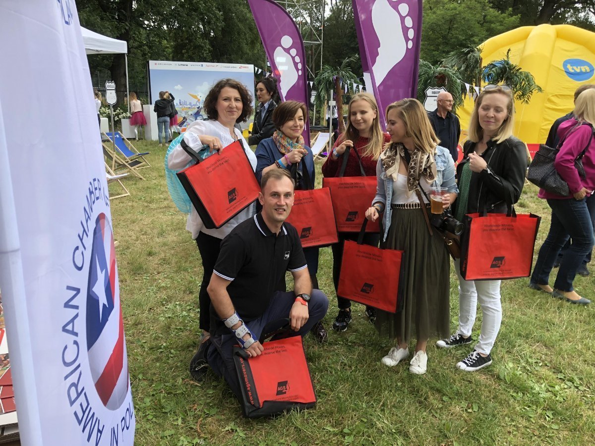 People with AGS Movers bags at the Independance Day Picnic in Poland in 2018.