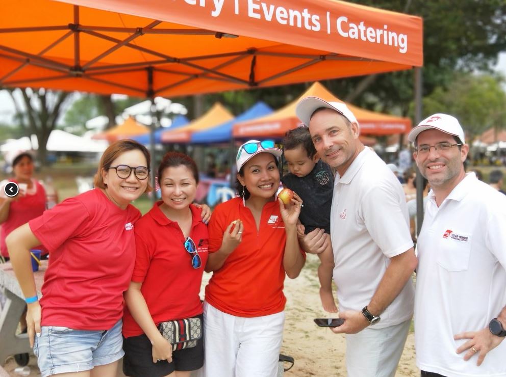 AGS Singapore team members at Pétanque tournament.